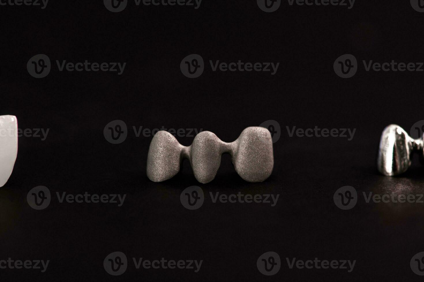 Teeth implant and crown installation process parts isolated on a black background. Medically accurate 3D model. photo