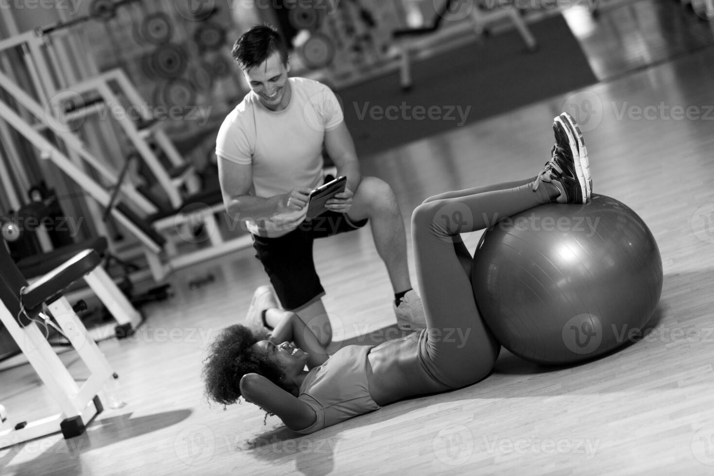 pilates  workout with personal trainer at gym photo