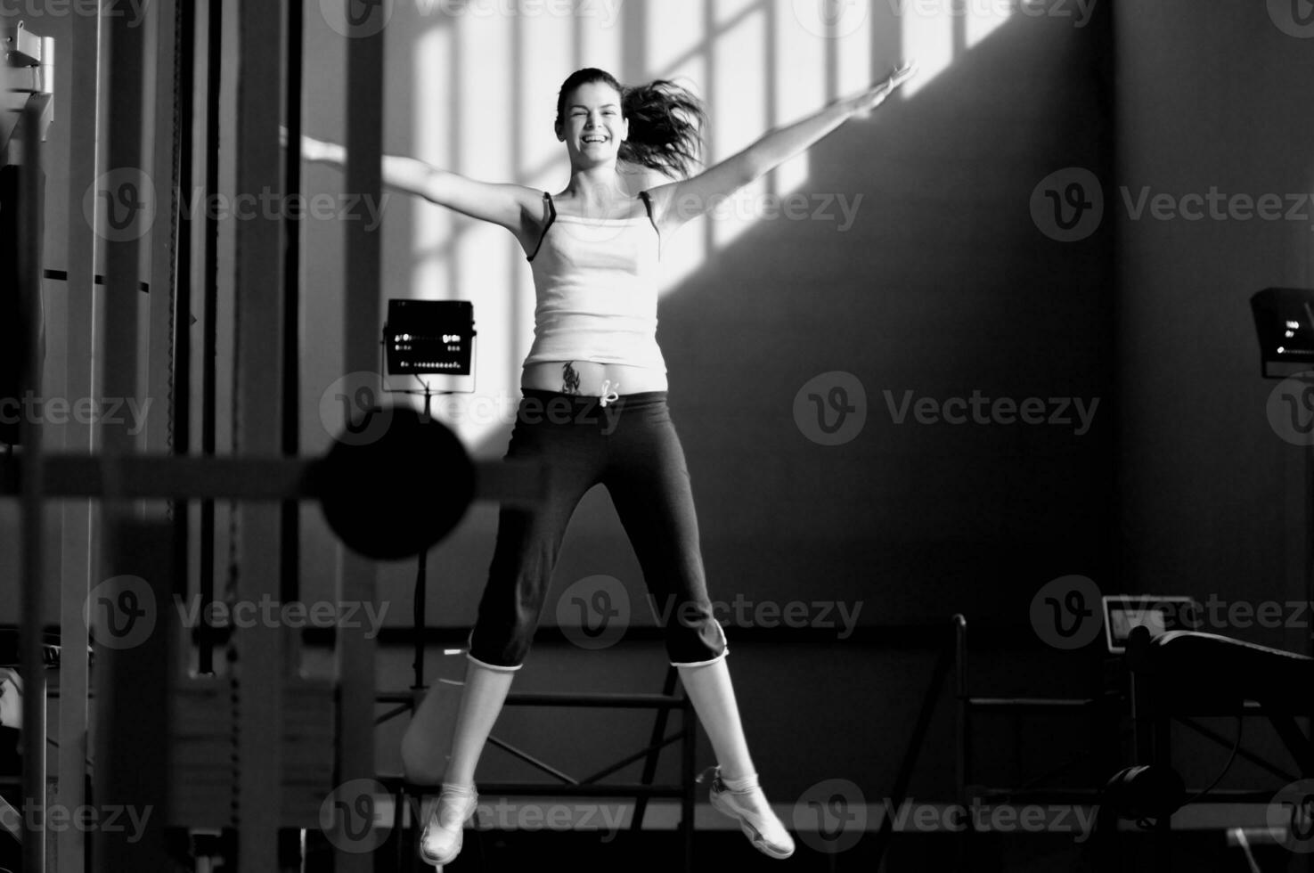 one young happy  woman jump photo