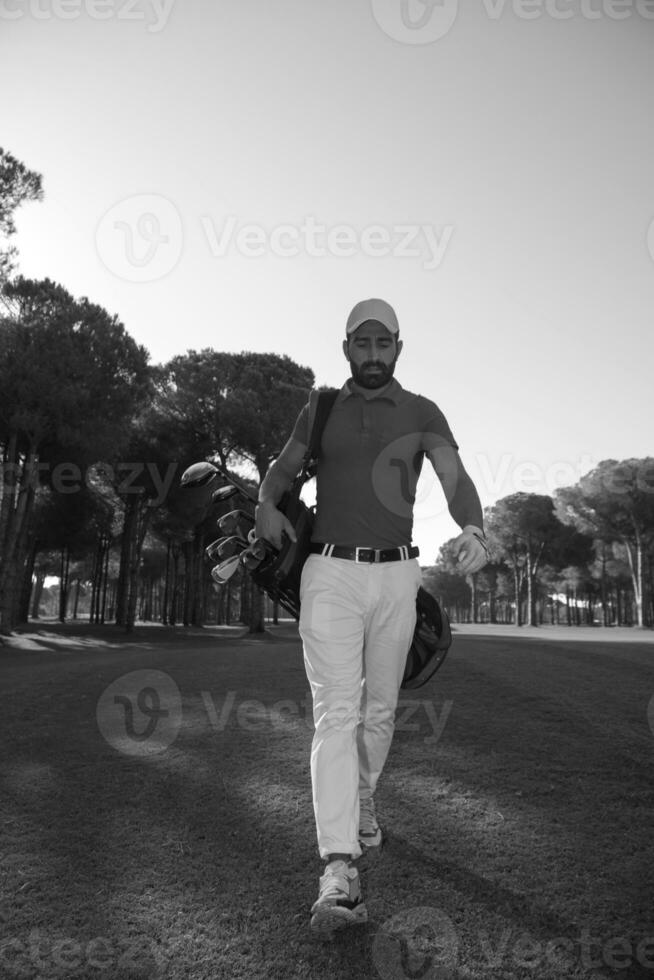 golf player walking photo