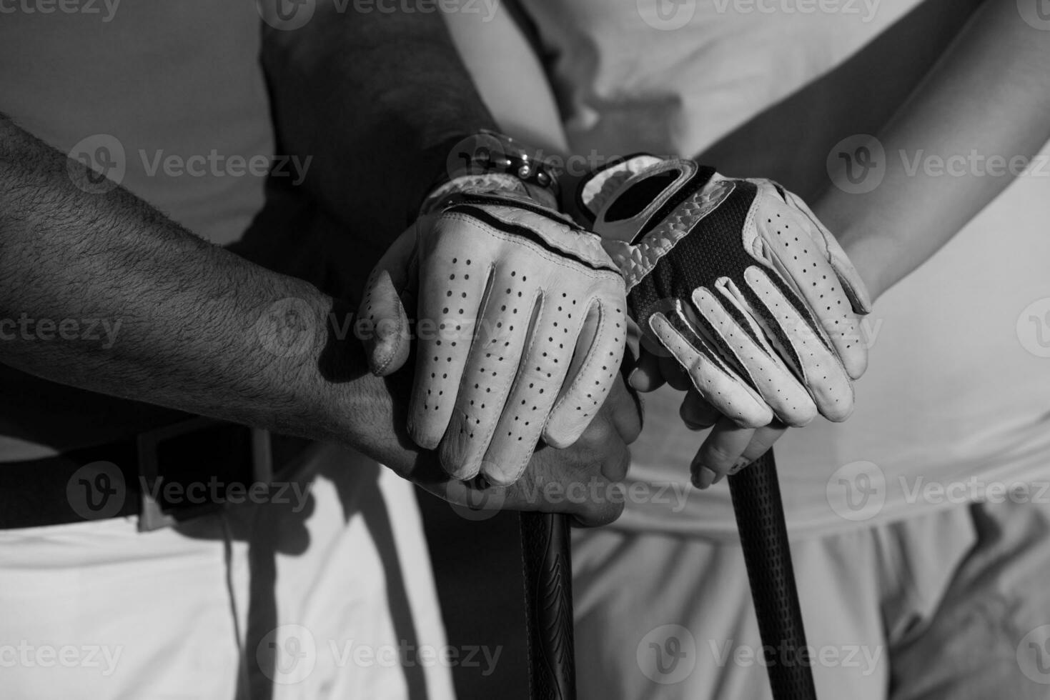 portrait of couple on golf course photo