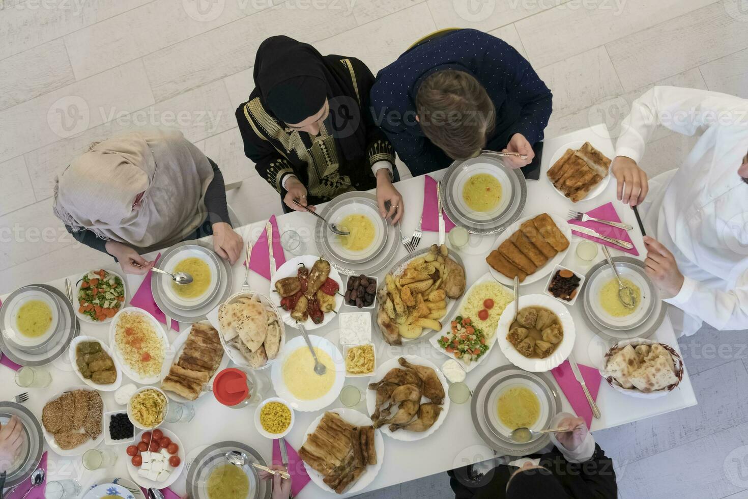 Top view of muslim family having Iftar during Ramadan holy month photo