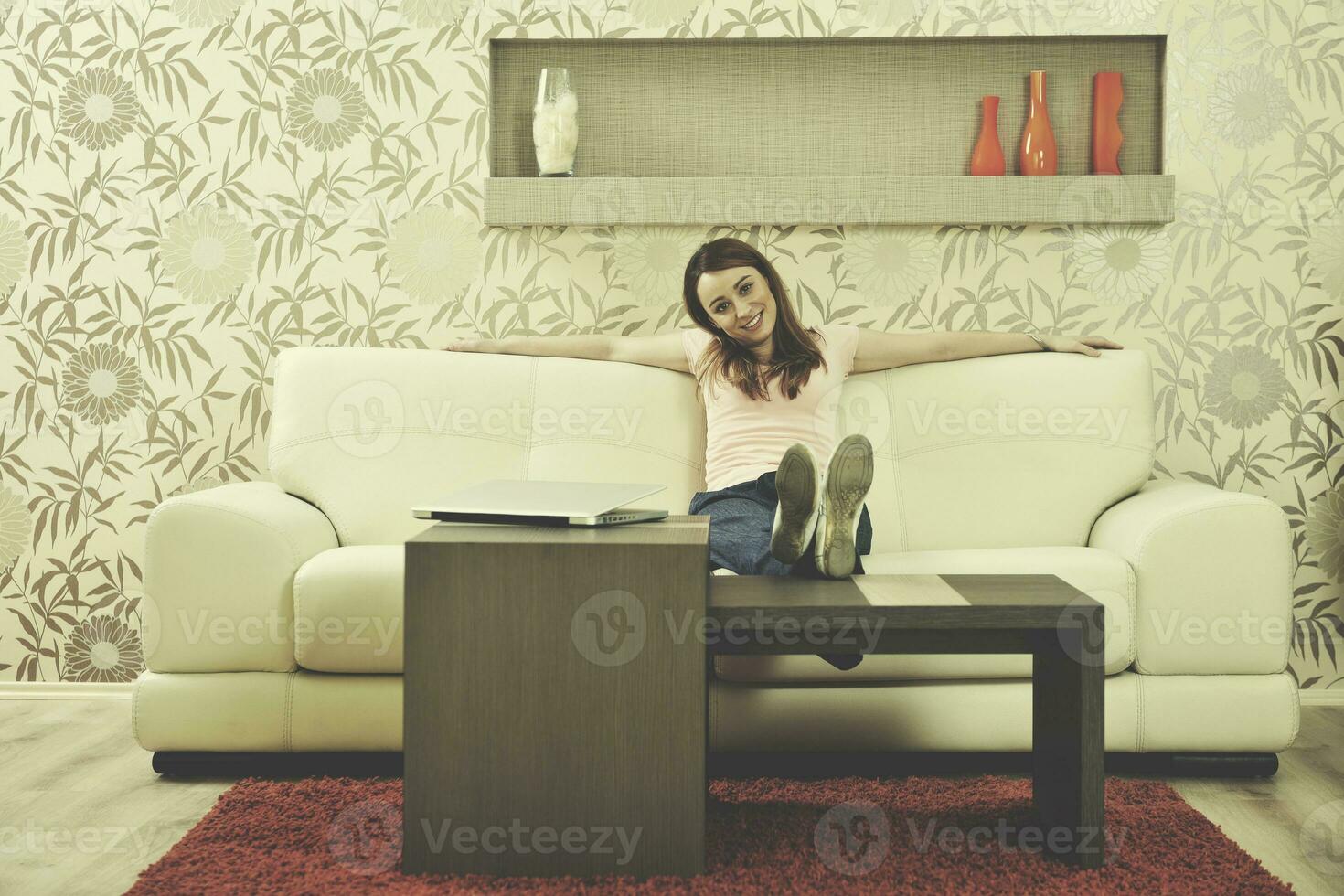 woman relaxing and working at home photo