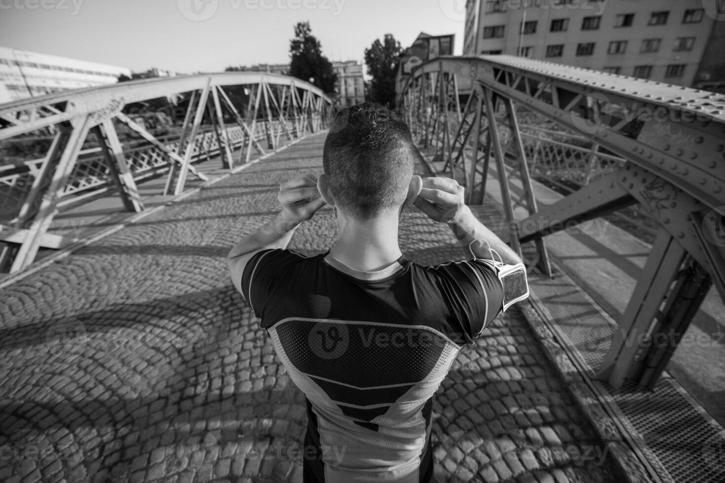 portrait of a jogging man at sunny morning photo