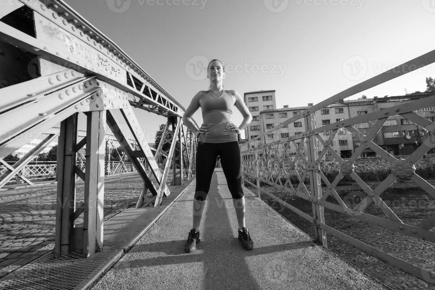 portrait of a jogging woman at sunny morning photo