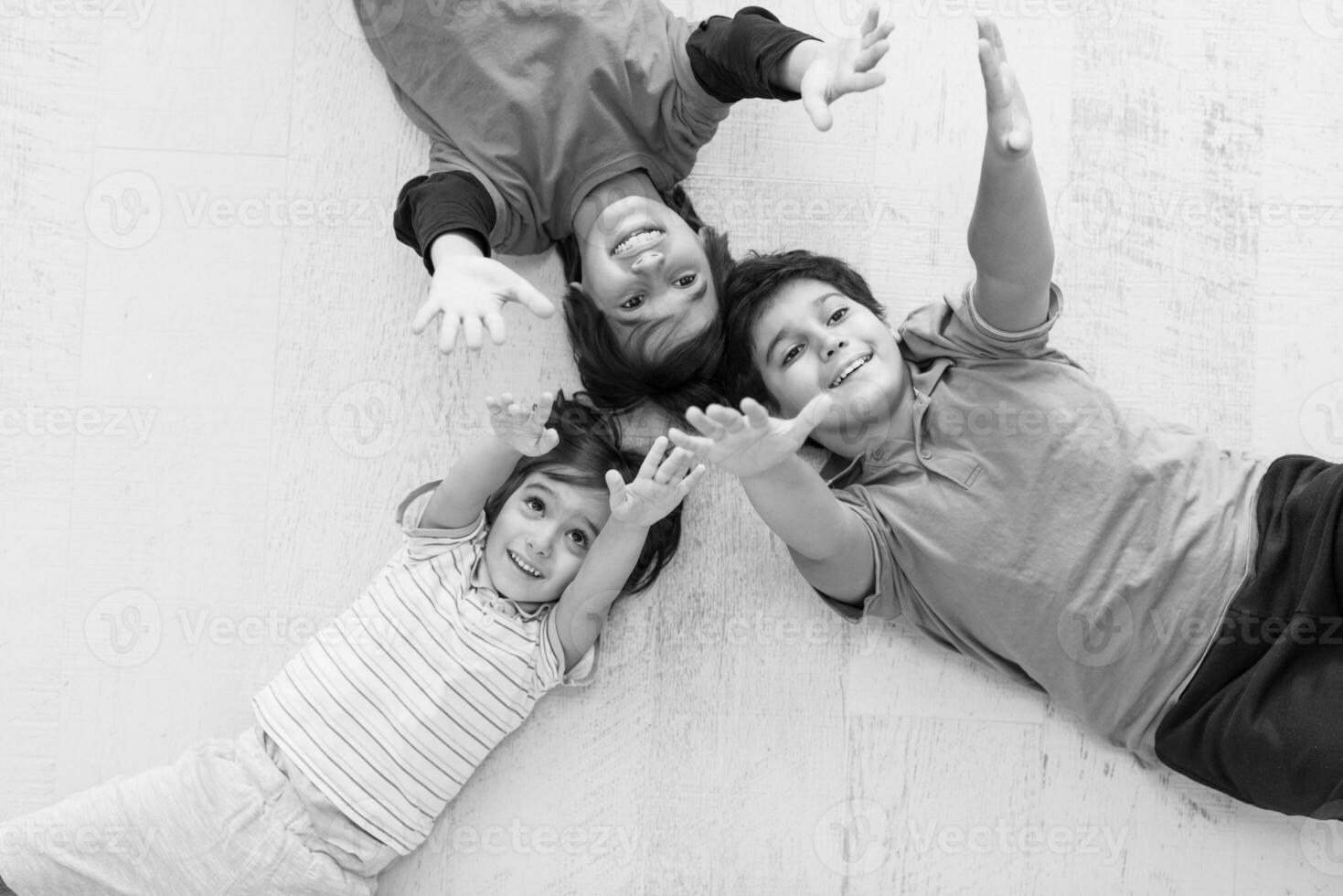 young boys having fun on the floor photo