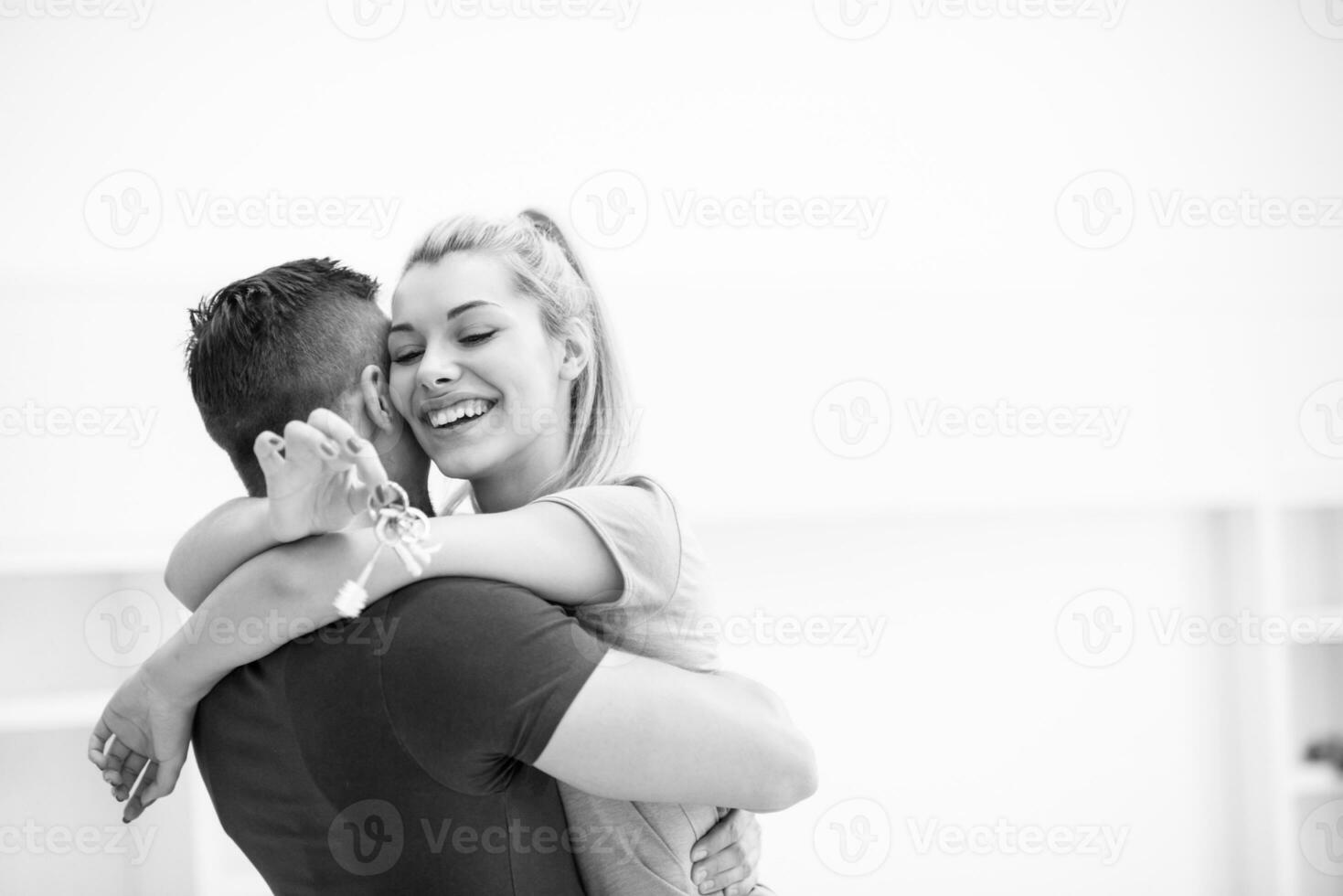 happy Young couple moving in new house photo