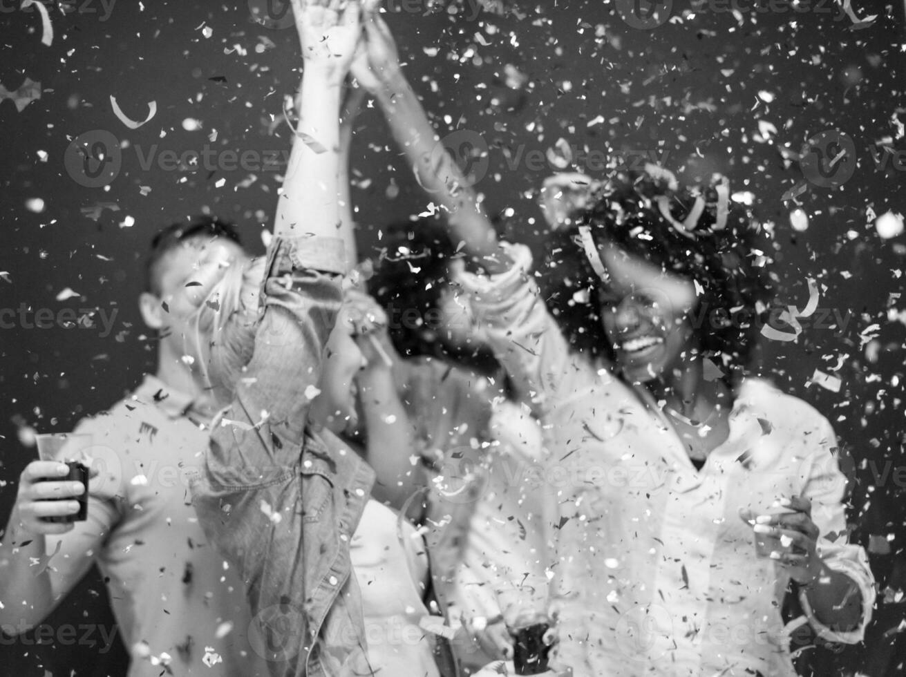 confetti party multiethnic group of people photo