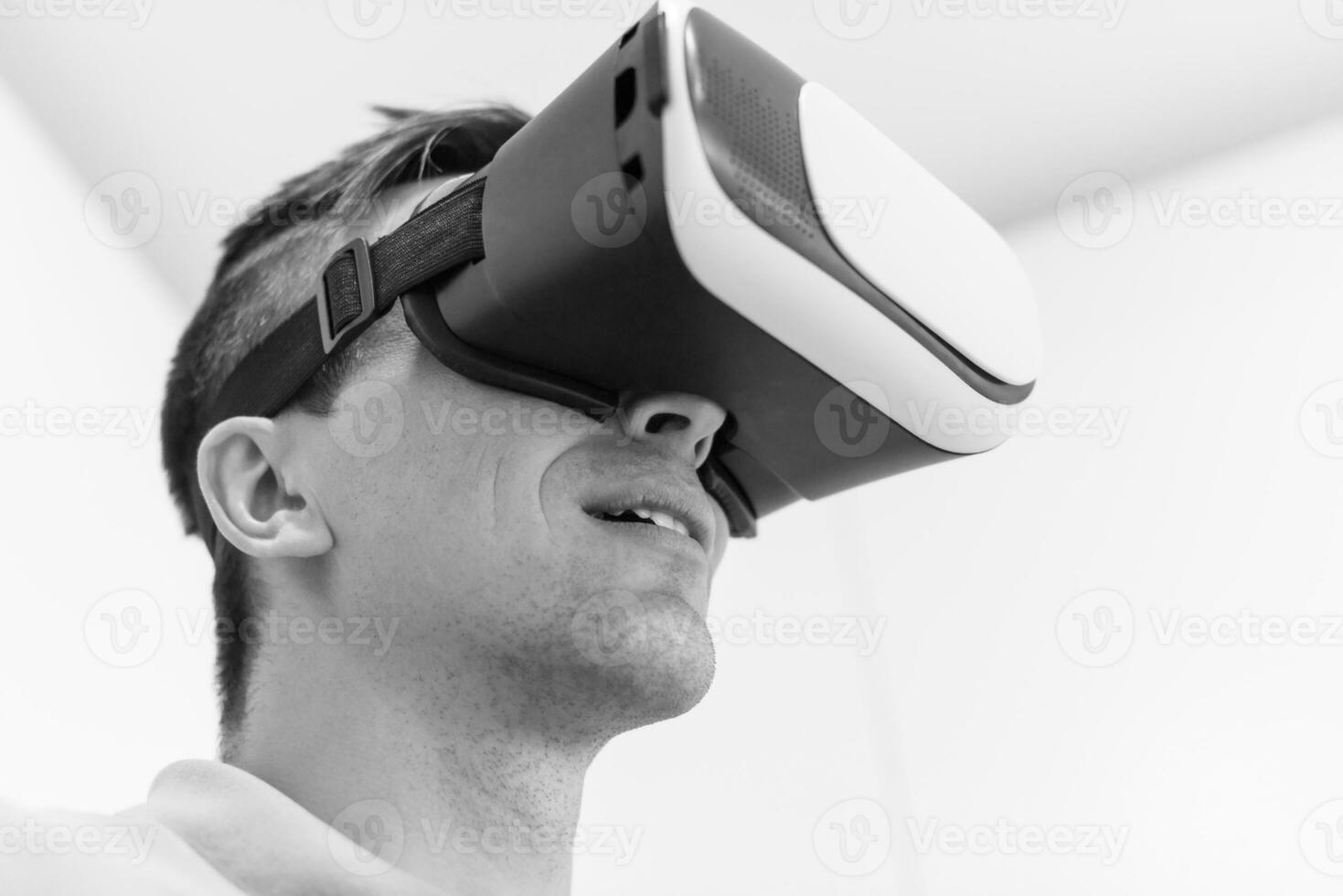 man using VR-headset glasses of virtual reality photo