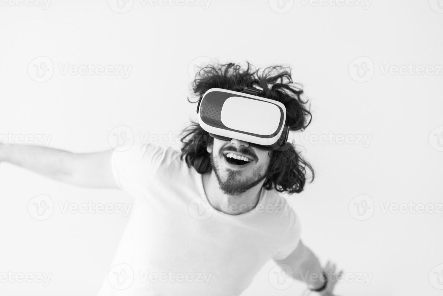 Man using headset of virtual reality photo