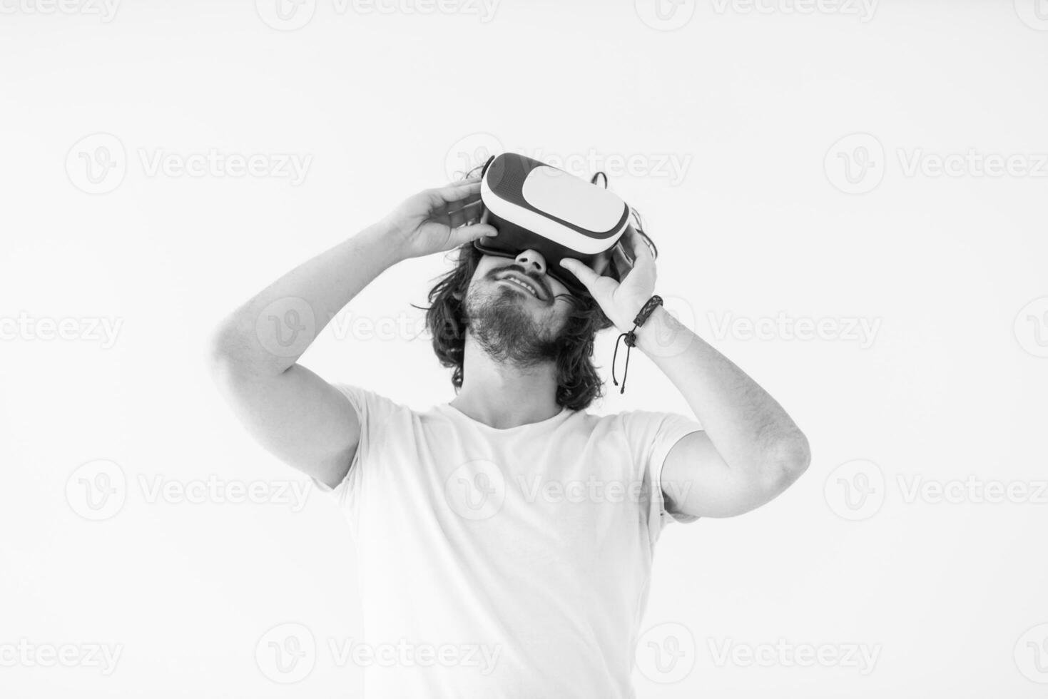 Man using headset of virtual reality photo