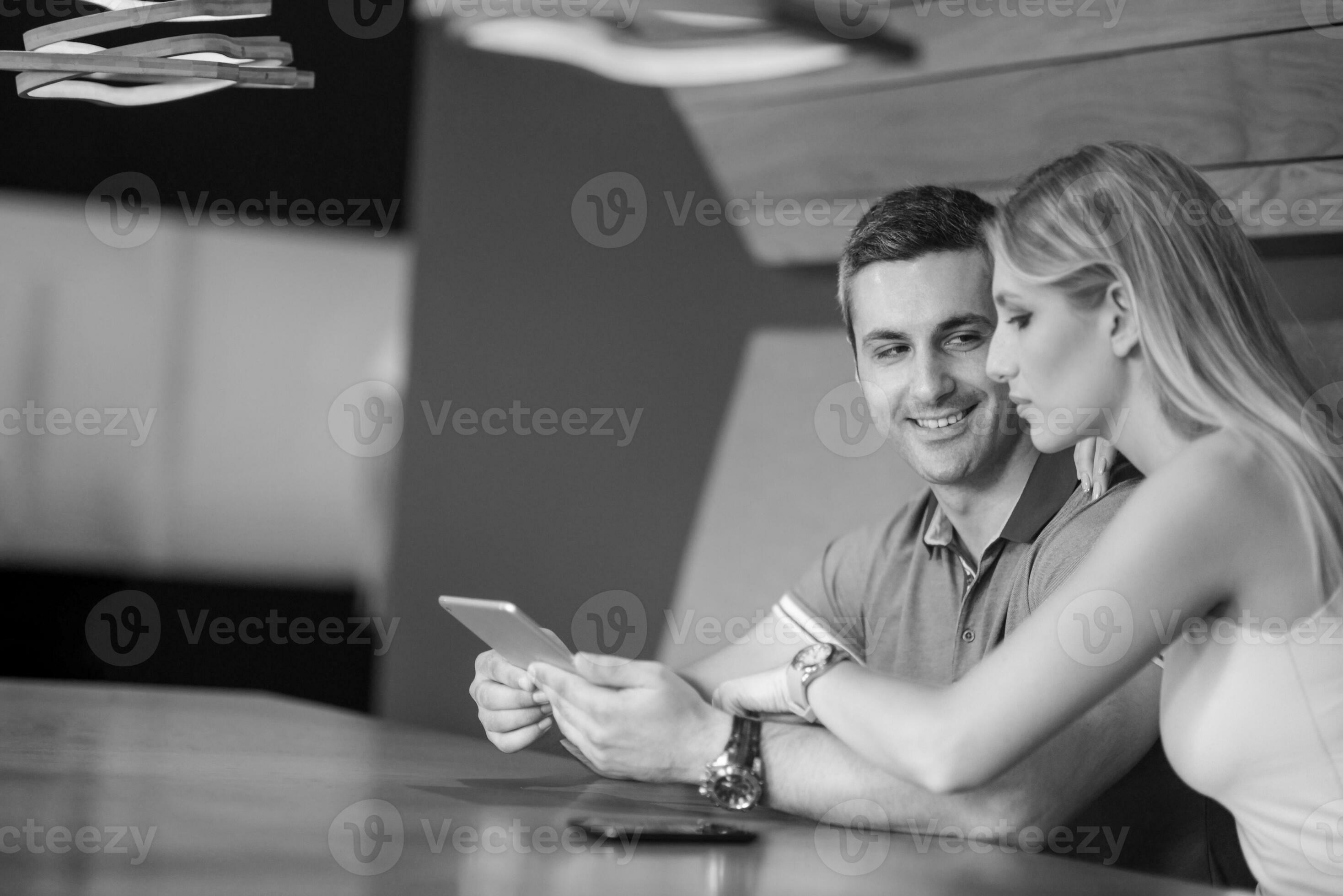 couple-using-tablet-at-home-31041621-stock-photo-at-vecteezy