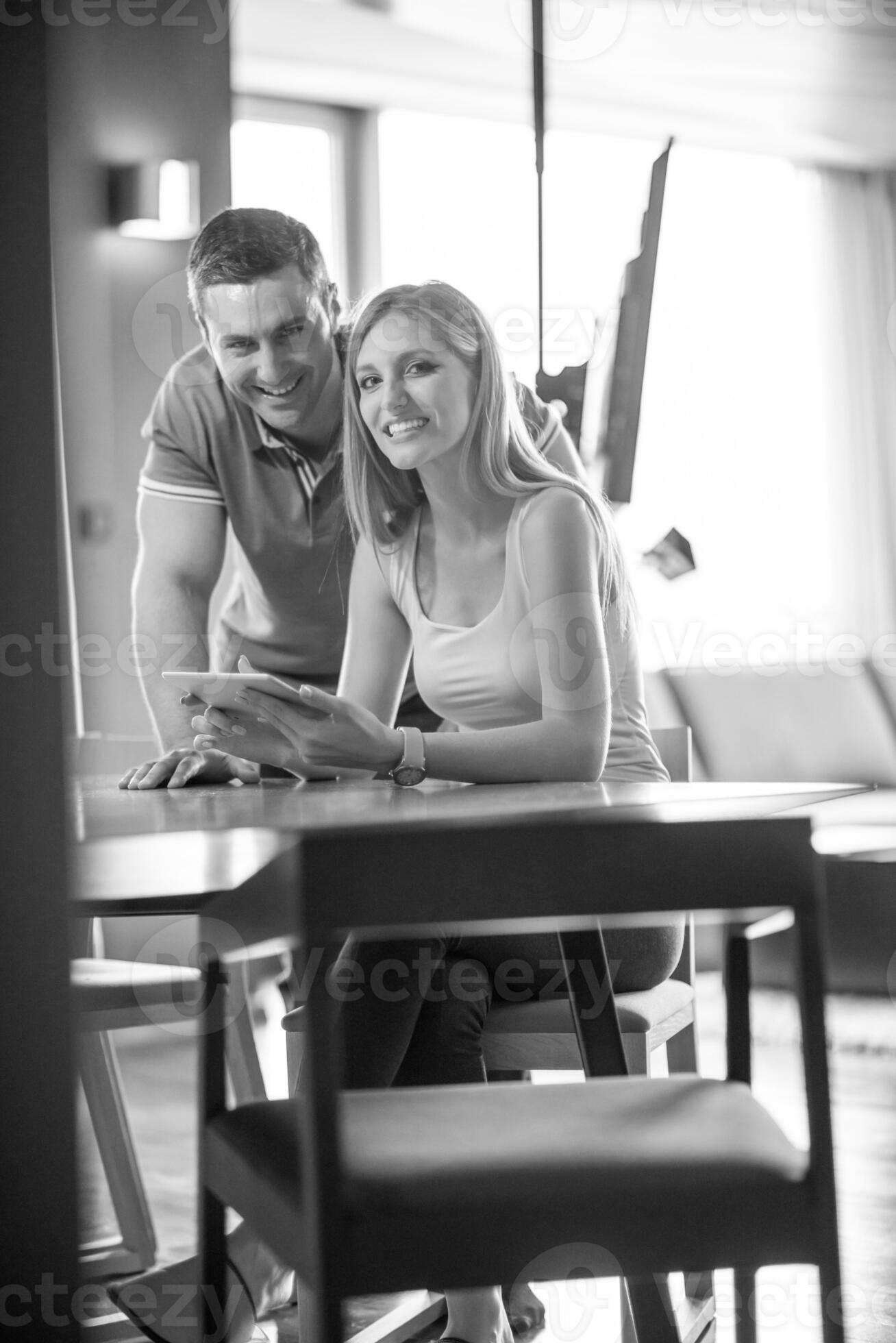 couple-using-tablet-at-home-31041645-stock-photo-at-vecteezy
