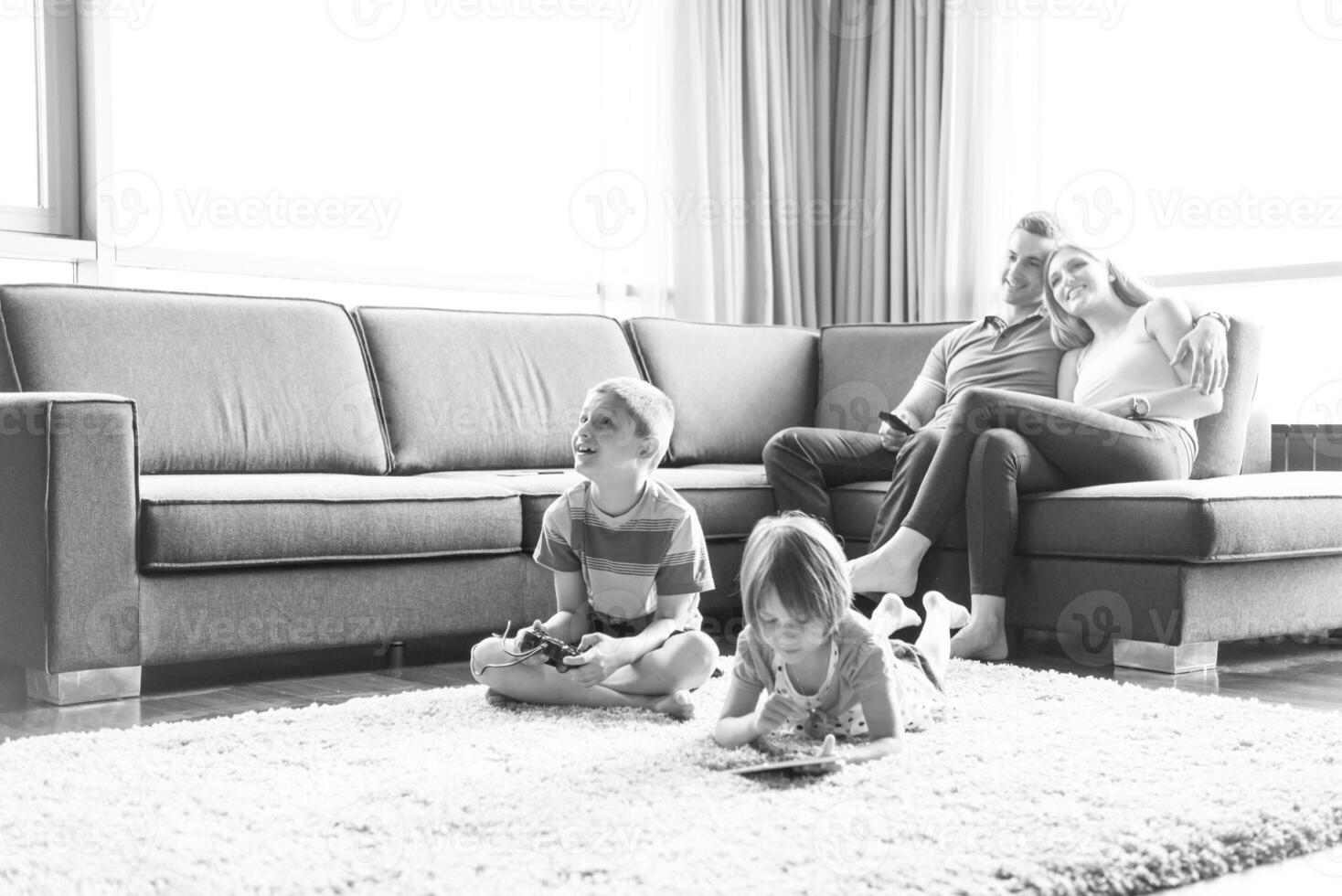 couple spending time with kids photo