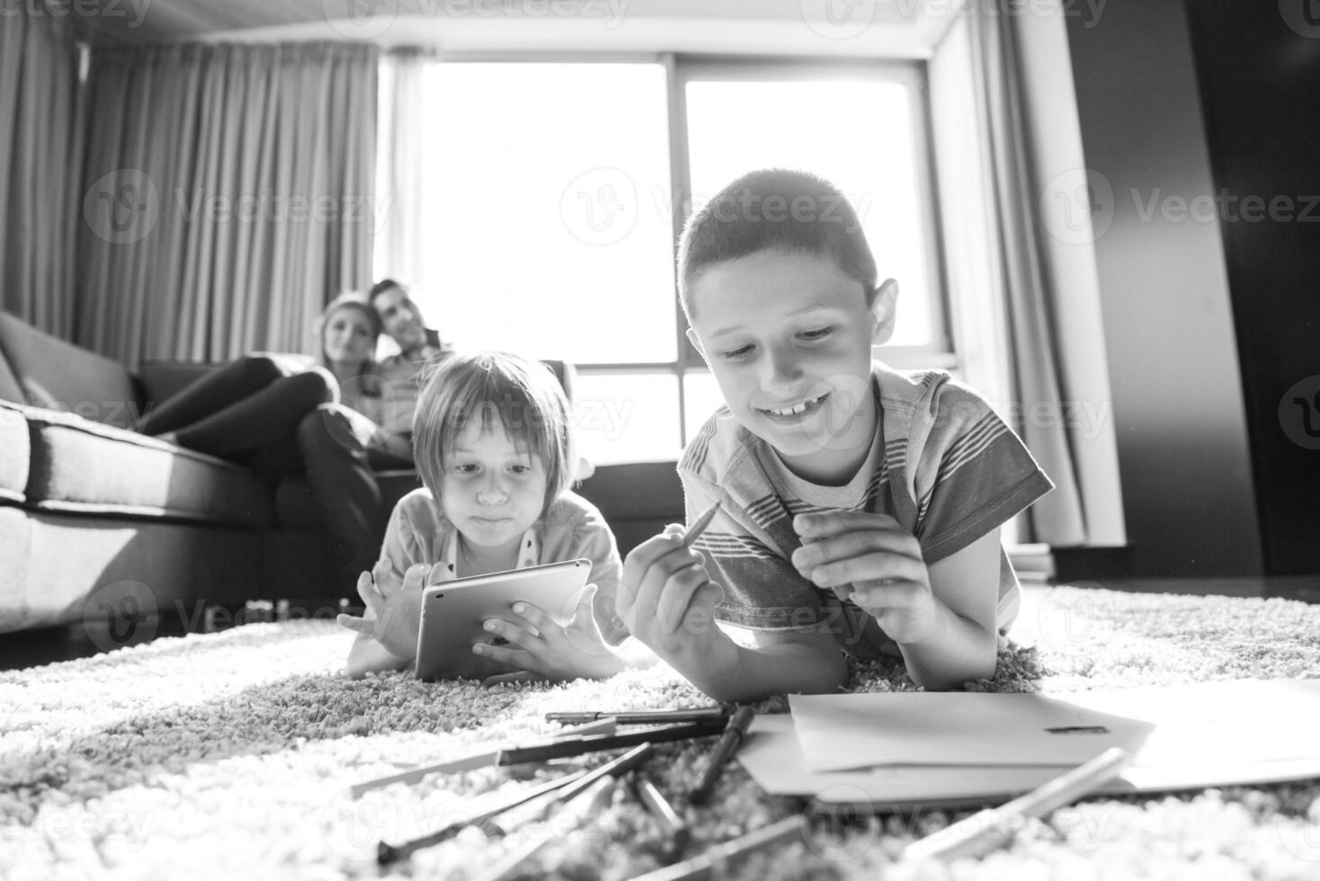 young couple spending time with kids photo