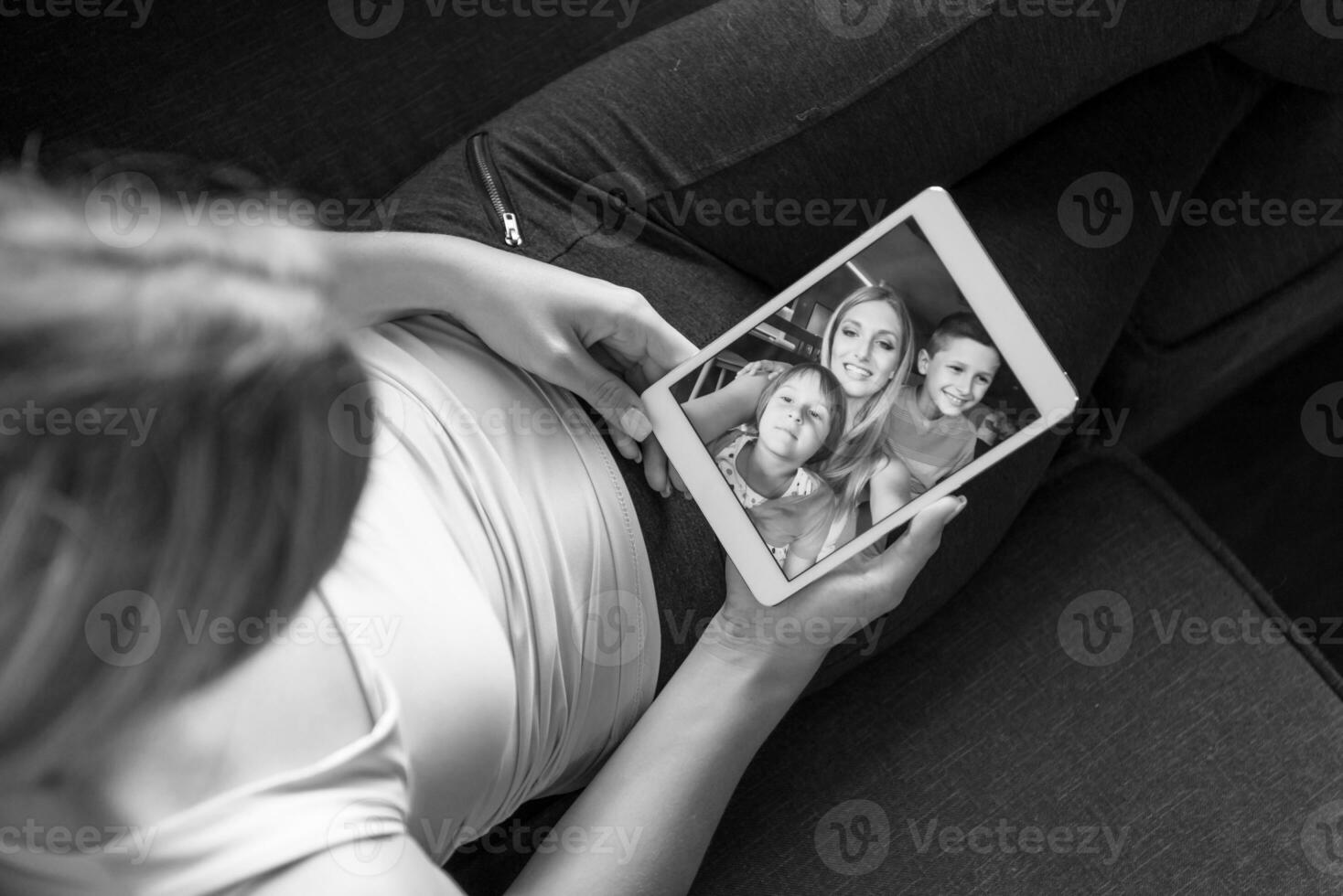 woman using tablet in beautiful apartment photo