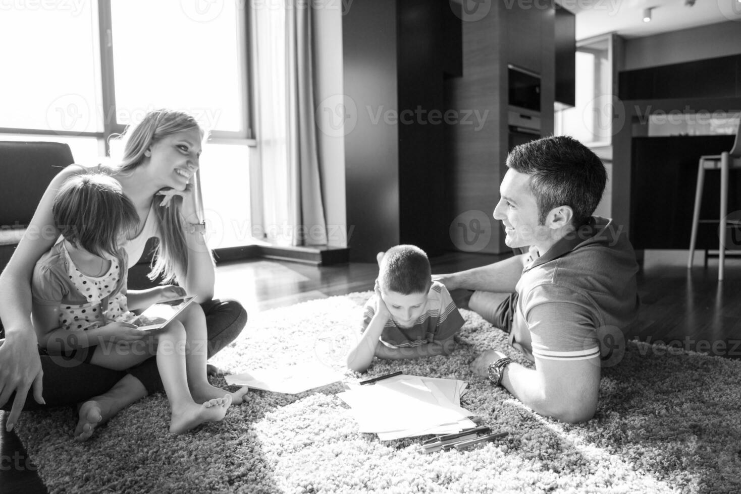 young couple spending time with kids photo
