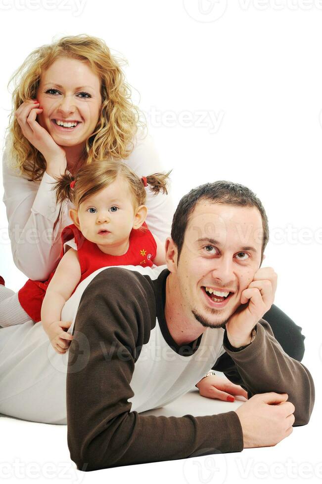 happy young family together in studio photo