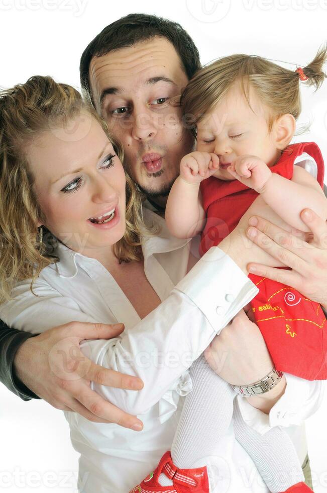 happy young family together in studio photo