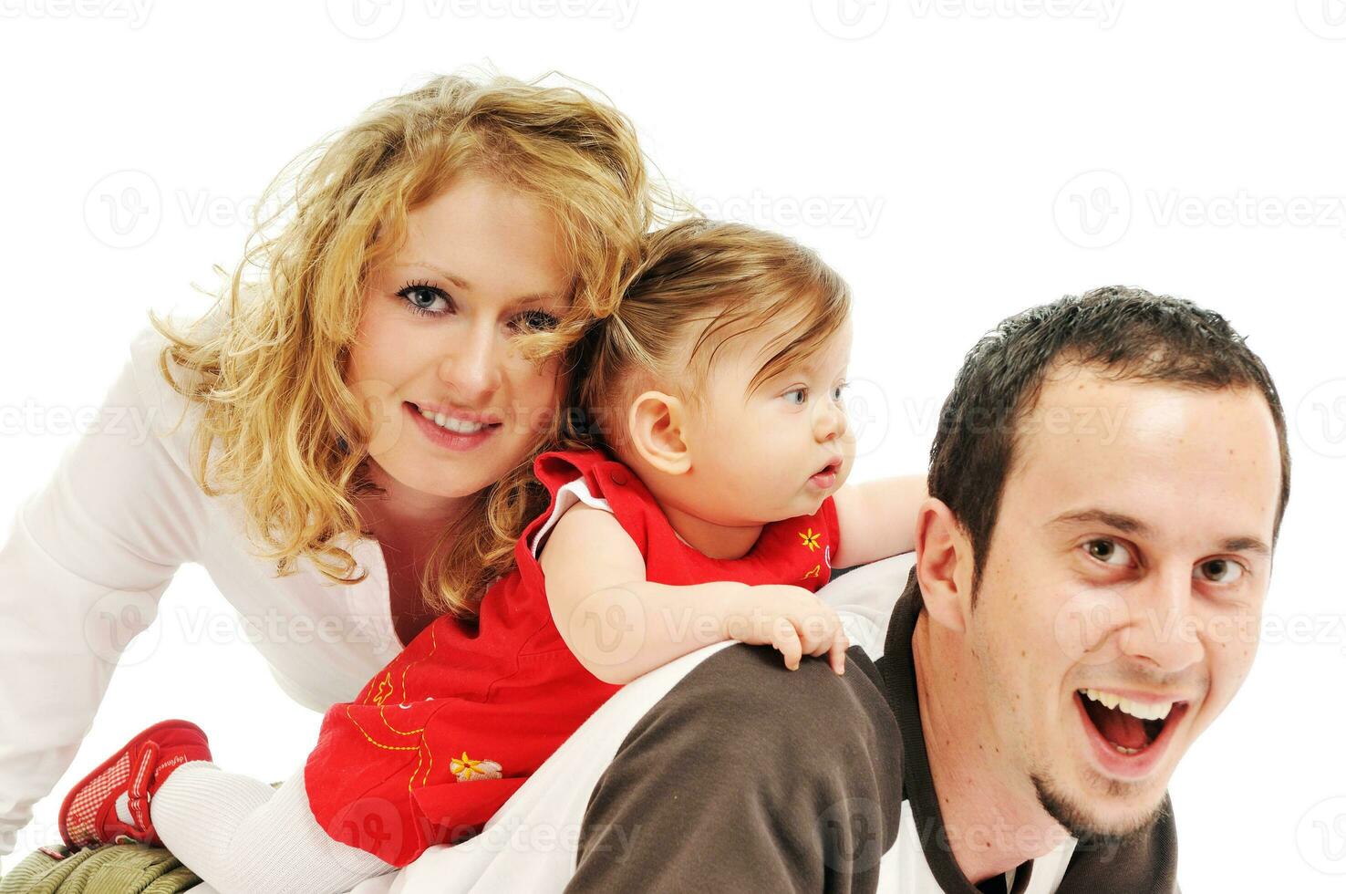 happy young family together in studio photo