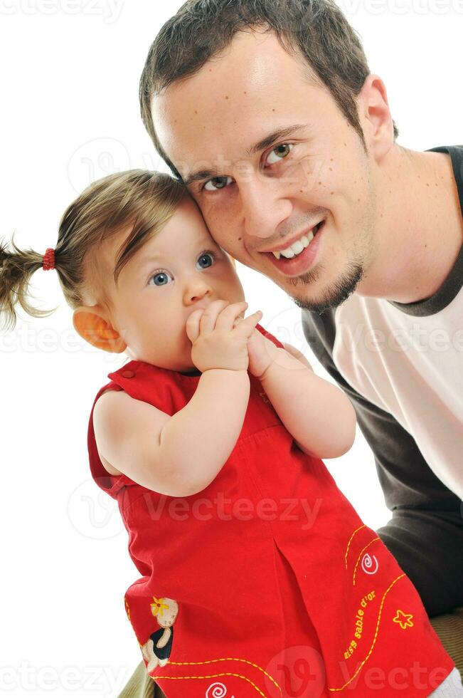 joven padre juega con una hermosa hija foto