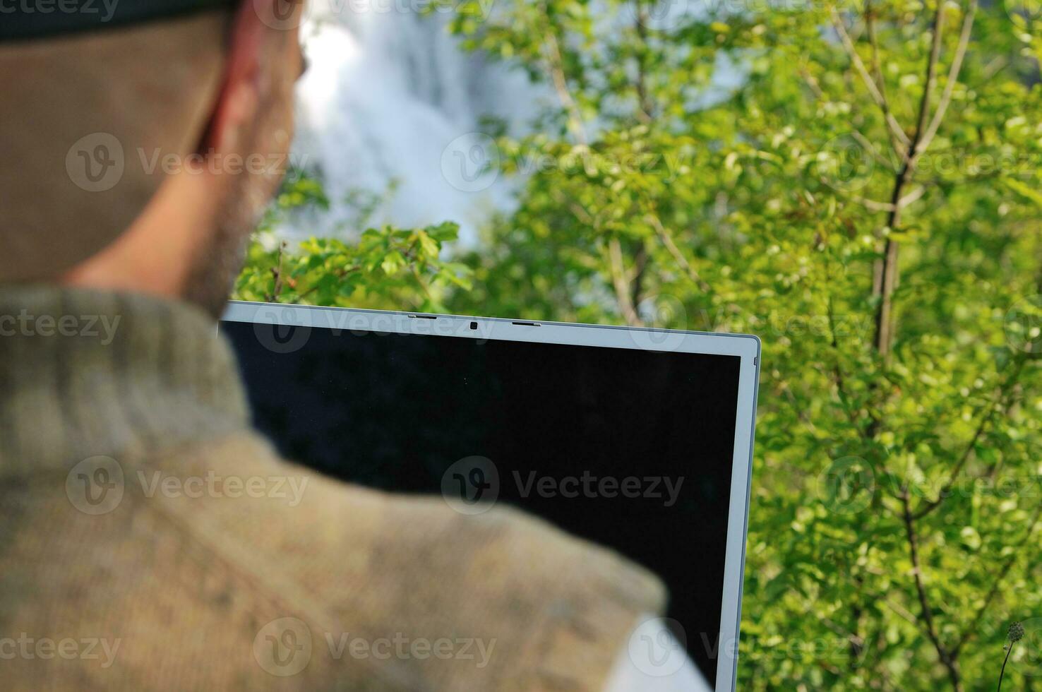 man outdoor laptop photo