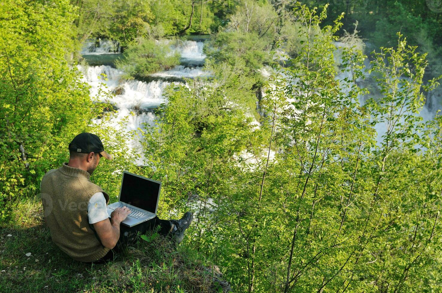 man outdoor laptop photo