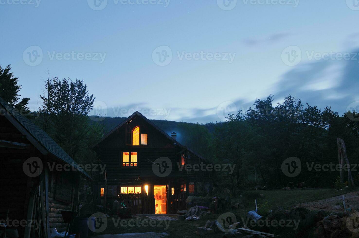 wooden countryside house in night photo