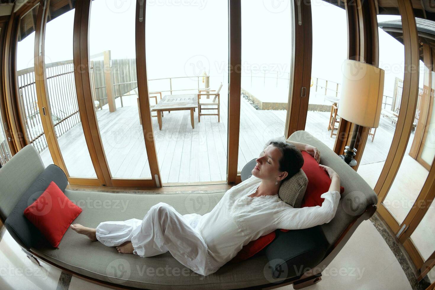 happy young woman relax at home on sofa photo