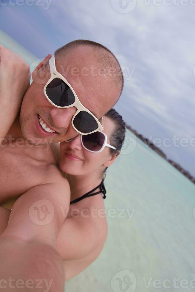 happy young couple have fun on summer photo