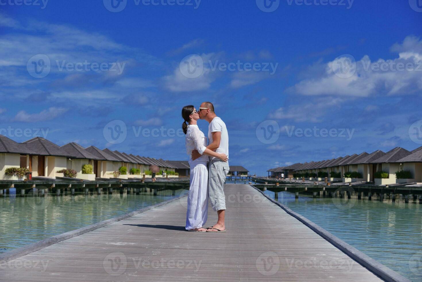 happy young  couple at summer vacation have fun and relax at beach photo