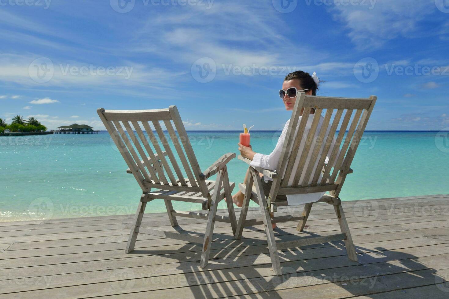 happy young couple relax and take fresh drink photo