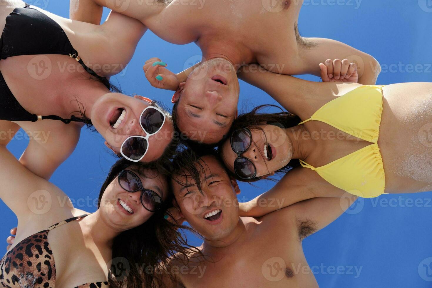 group of happy young people have fun on bach photo