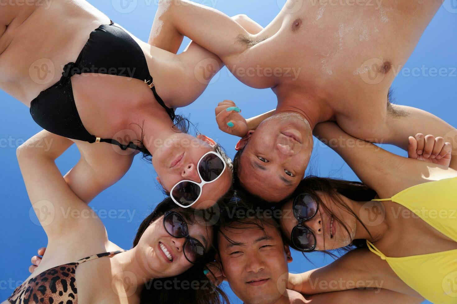 group of happy young people have fun on bach photo