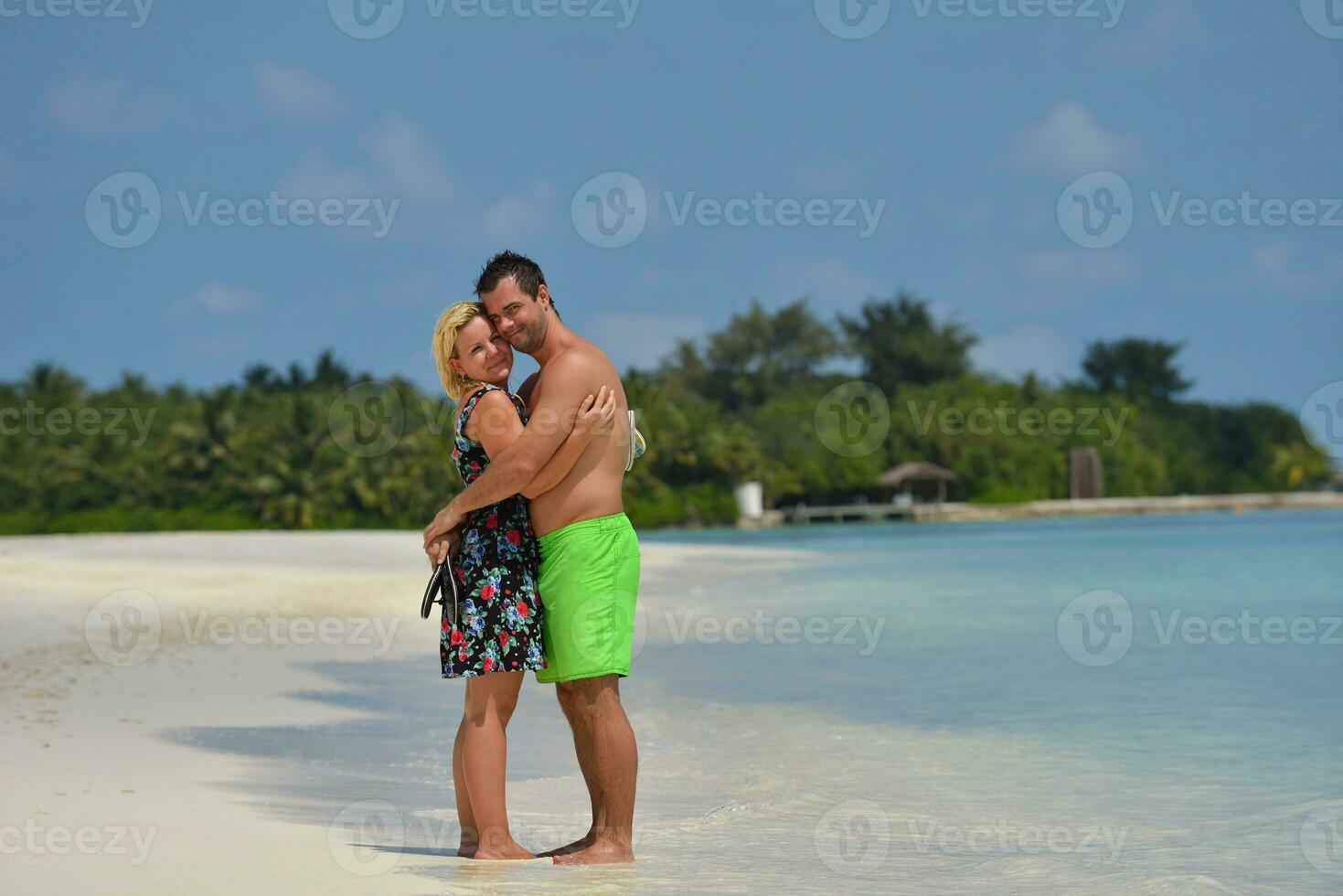 happy young  couple at summer vacation have fun and relax photo