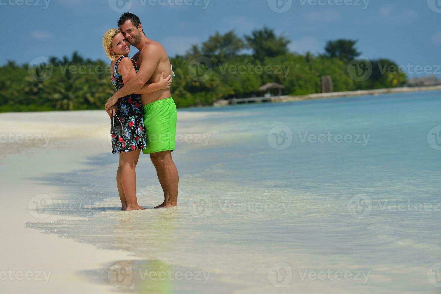 happy young  couple at summer vacation have fun and relax photo