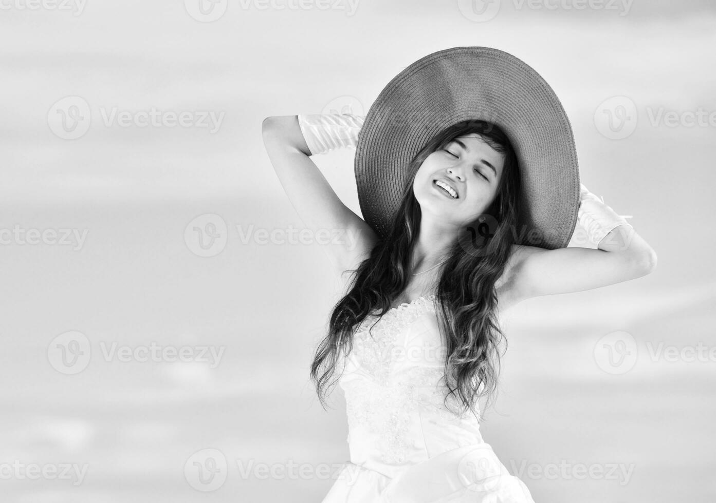 asian bride on beach photo