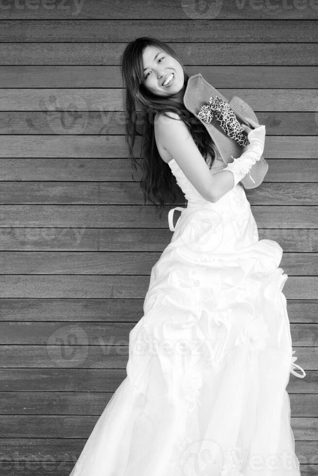 asian bride on beach photo