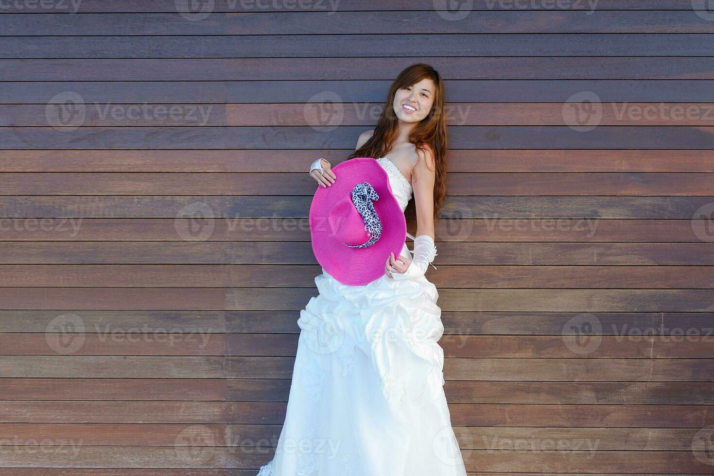 asian bride on beach photo