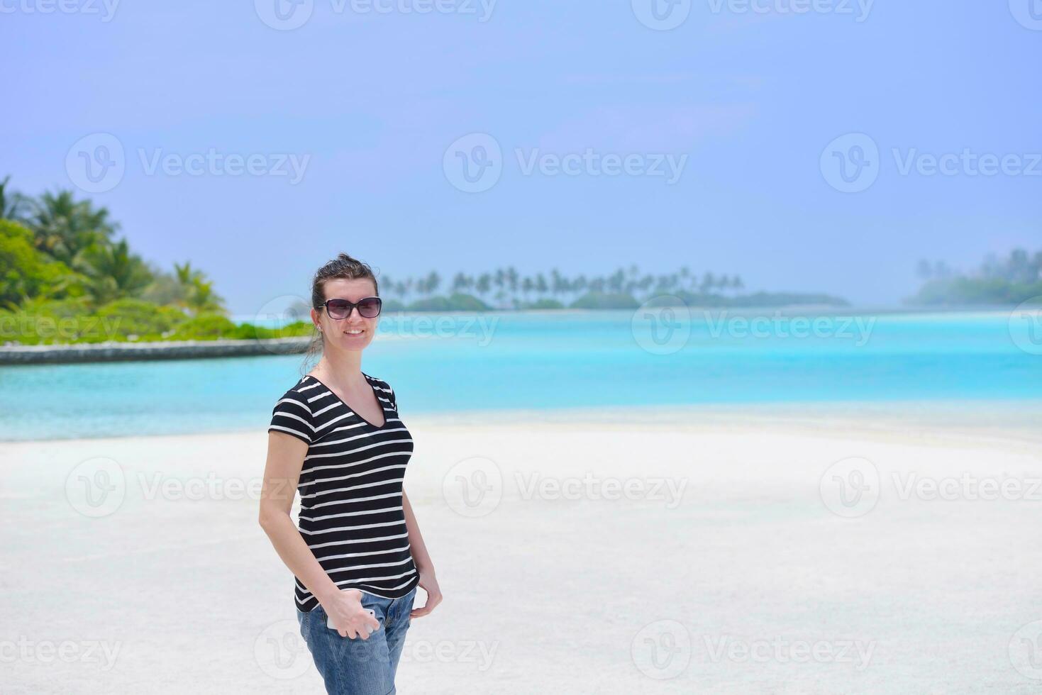 beautiful gril on beach have fun photo