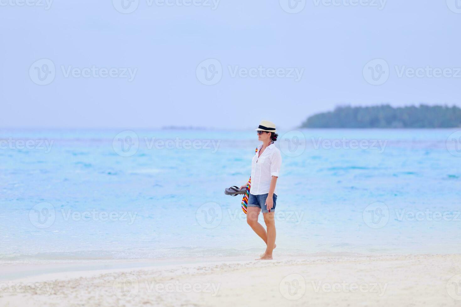 beautiful gril on beach have fun photo