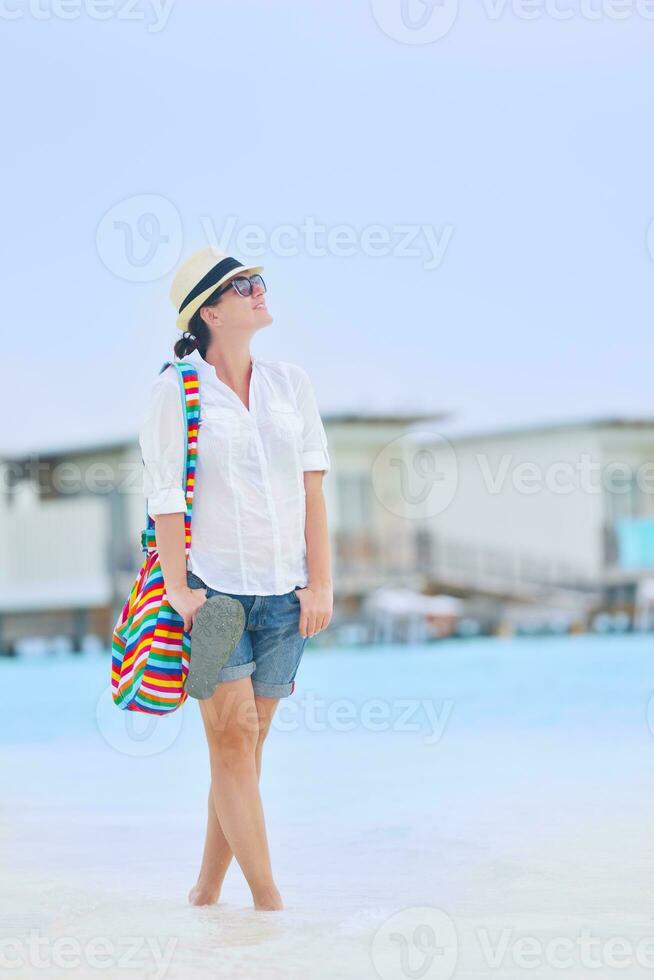 beautiful gril on beach have fun photo