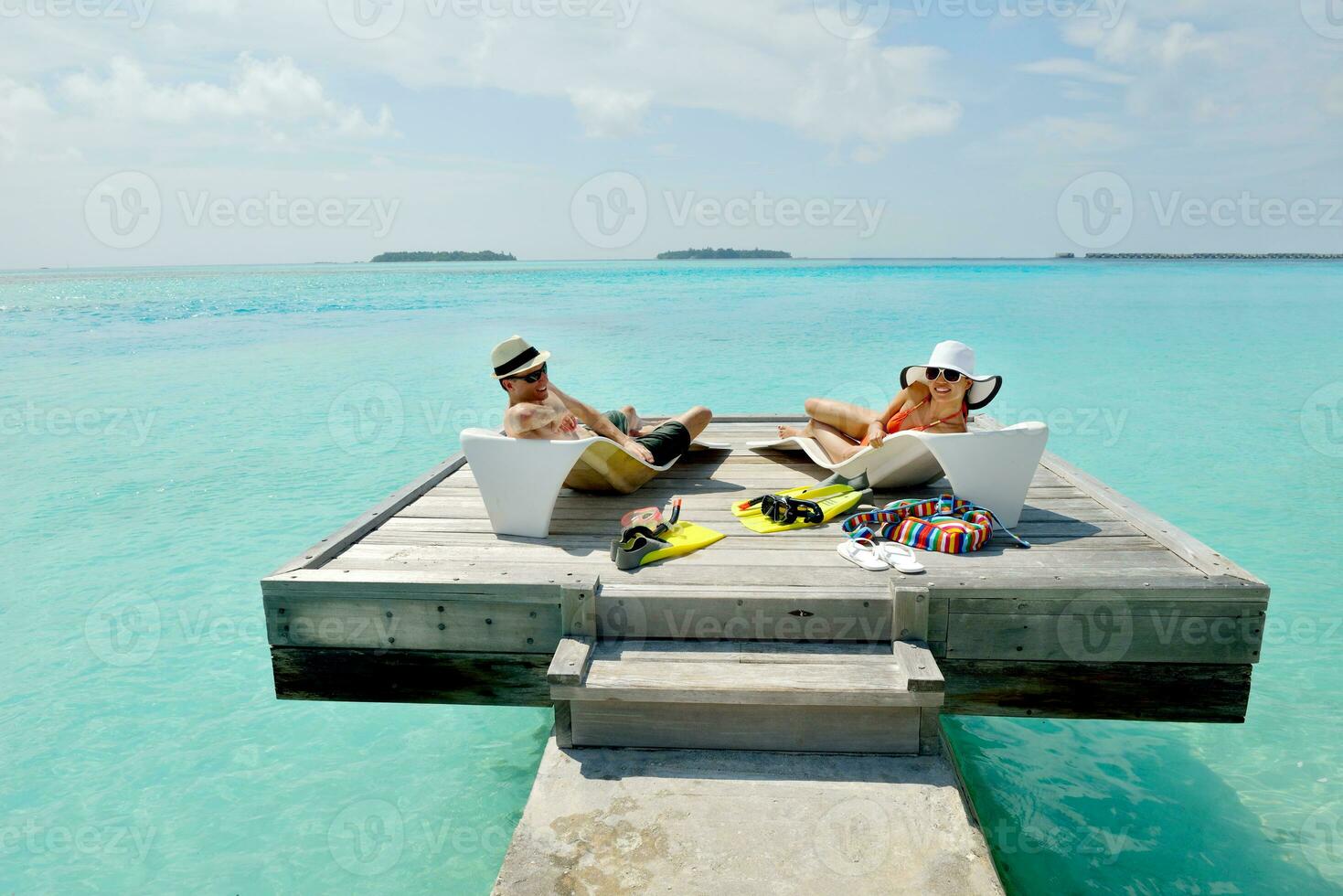 happy young couple have fun on beach photo