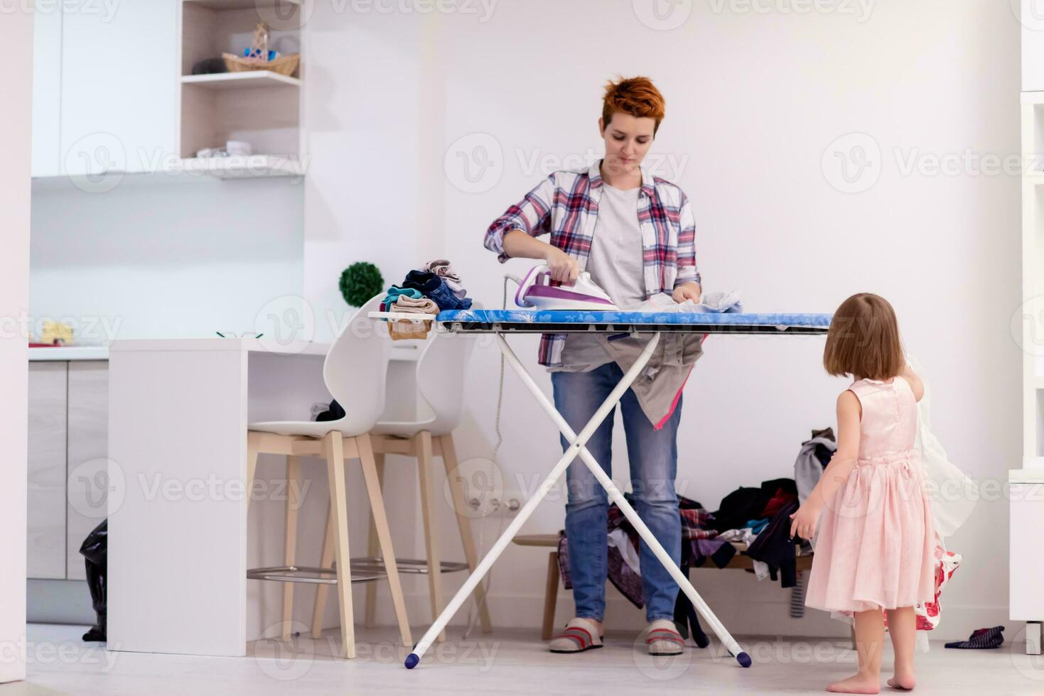 mother and little daughter spending time together at home photo