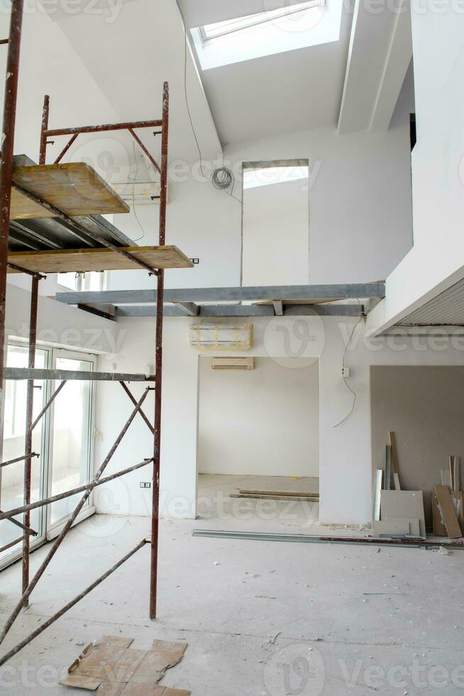 interior of construction site with scaffolding photo