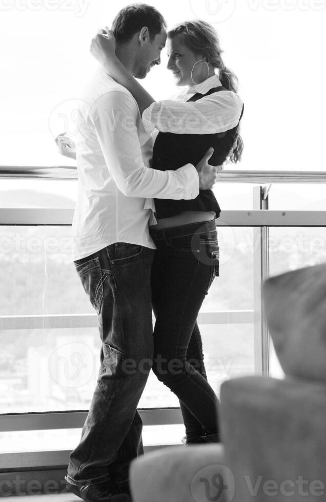 romantic happpy couple on balcony photo