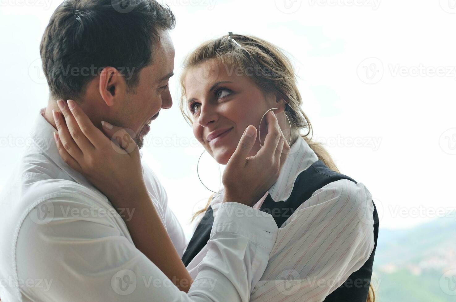 romantic happpy couple on balcony photo