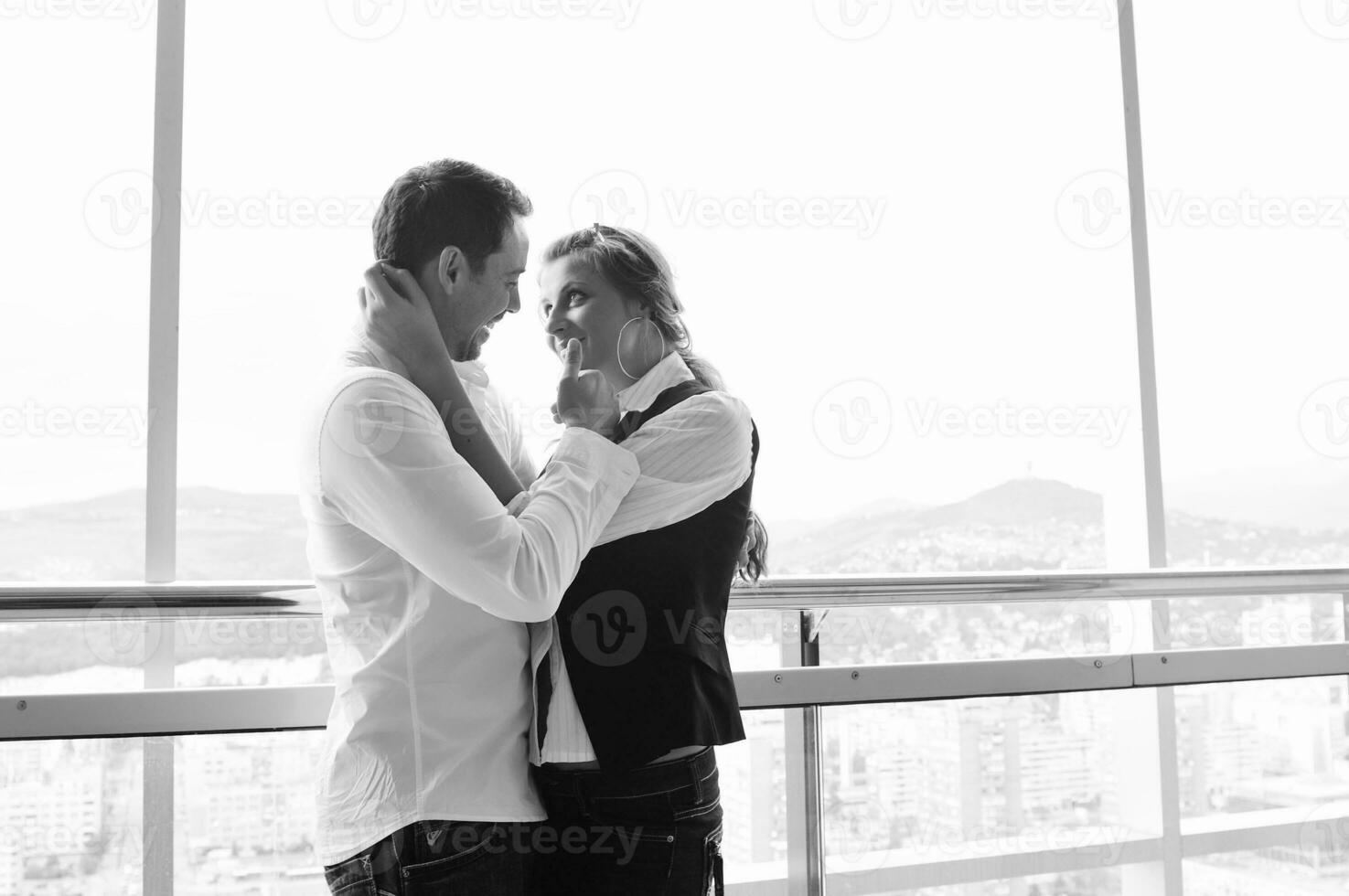 romantic happpy couple on balcony photo