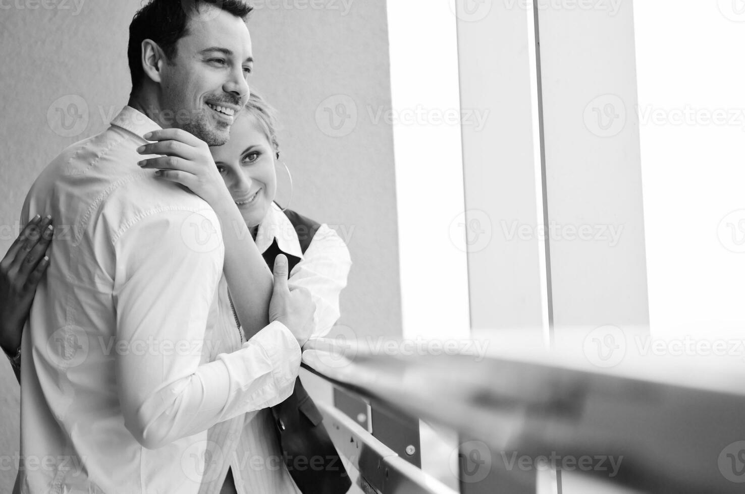 romantic happpy couple on balcony photo