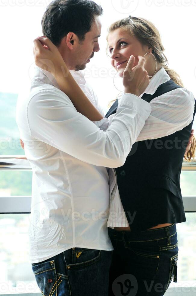 romantic happpy couple on balcony photo